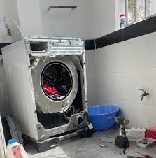 sua-may-giat-gia-lam