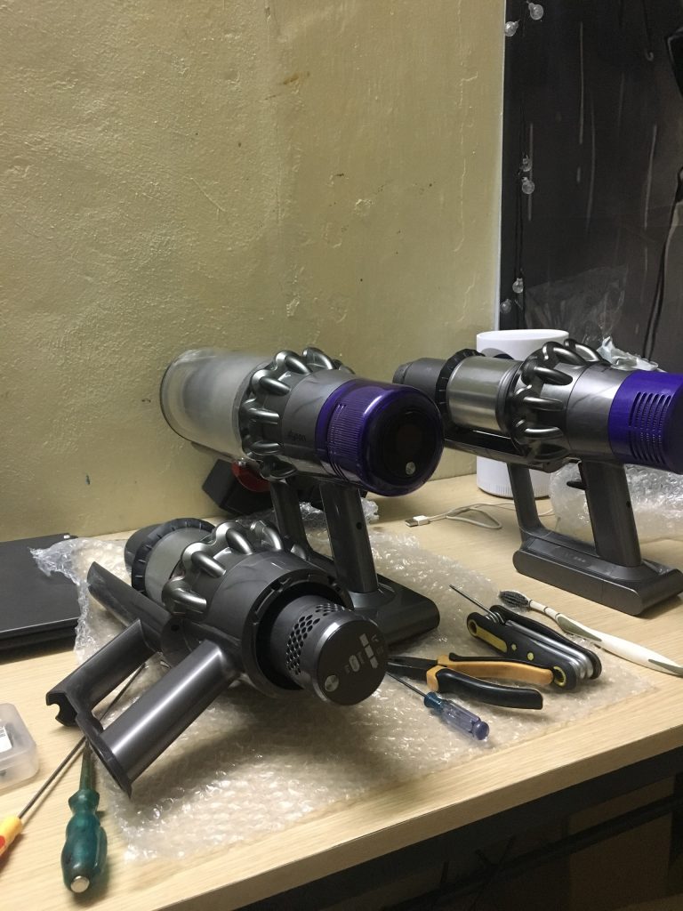 sua-may-hut-bui-cam-tay--