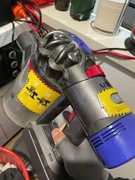 sua-may-hut-bui-cam-tay-1